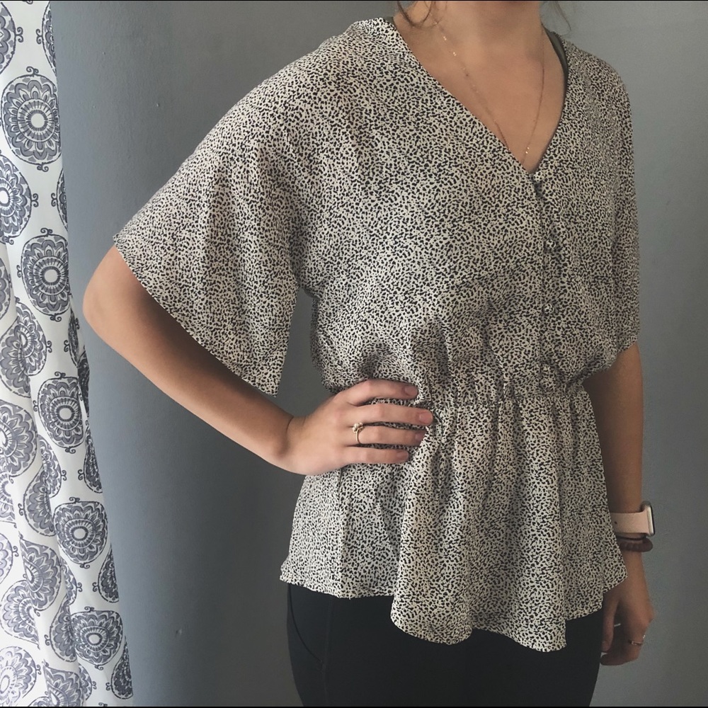 White and black blouse size medium